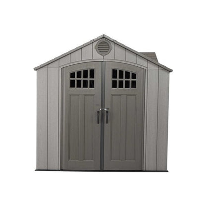 Gray garden shed with double doors and window panes against a white background.
