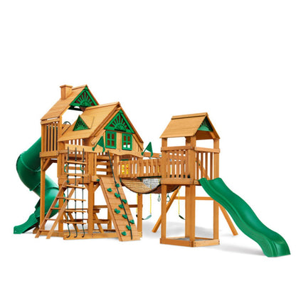 The Gorilla Playsets Treasure Trove II Treehouse Wooden Swing Set features two playhouses, green slides, ladders, a climbing wall, net bridge, and swings—all shown against a white background.