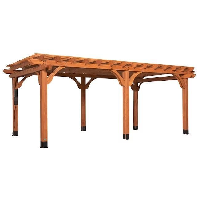 The Backyard Discovery 20′ x 12′ Beaumont Pergola features premium cedar wood, four sturdy posts with black metal brackets for stability, and an open slatted roof—combining strength and elegance for your outdoor space.