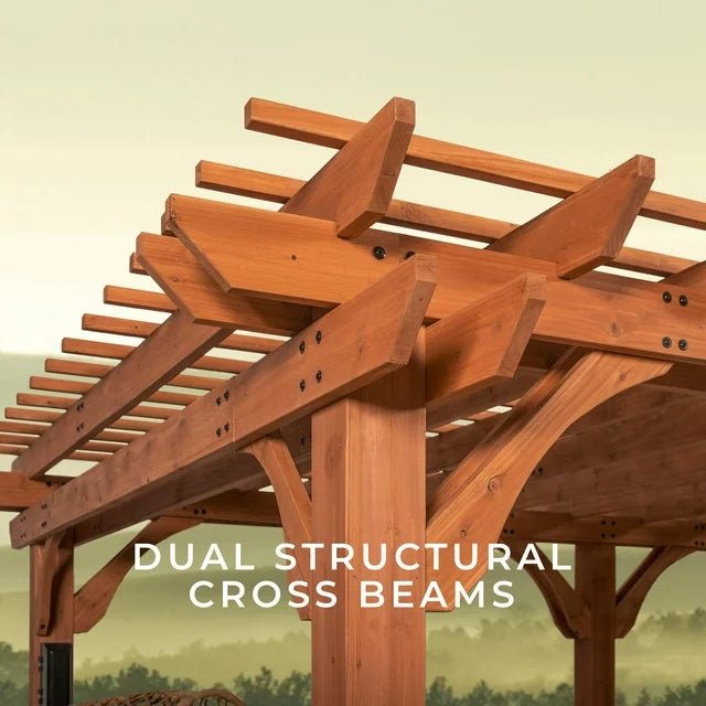 Wooden pergola features dual structural cross beams attached with black bolts against a blurred forest background.